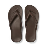 Brown Archies arch support thong footwear showing the comfortable footbed and supportive straps in a close-up view.