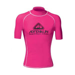 Pink Adrenalin Rashie Vivid Short Sleeve Junior rash guard for kids, featuring bright color and lightweight, UV-protective fabric.