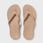 Hot pink Archies Arch Support Thong sandal showcasing comfortable footbed and stylish design on a flat surface.