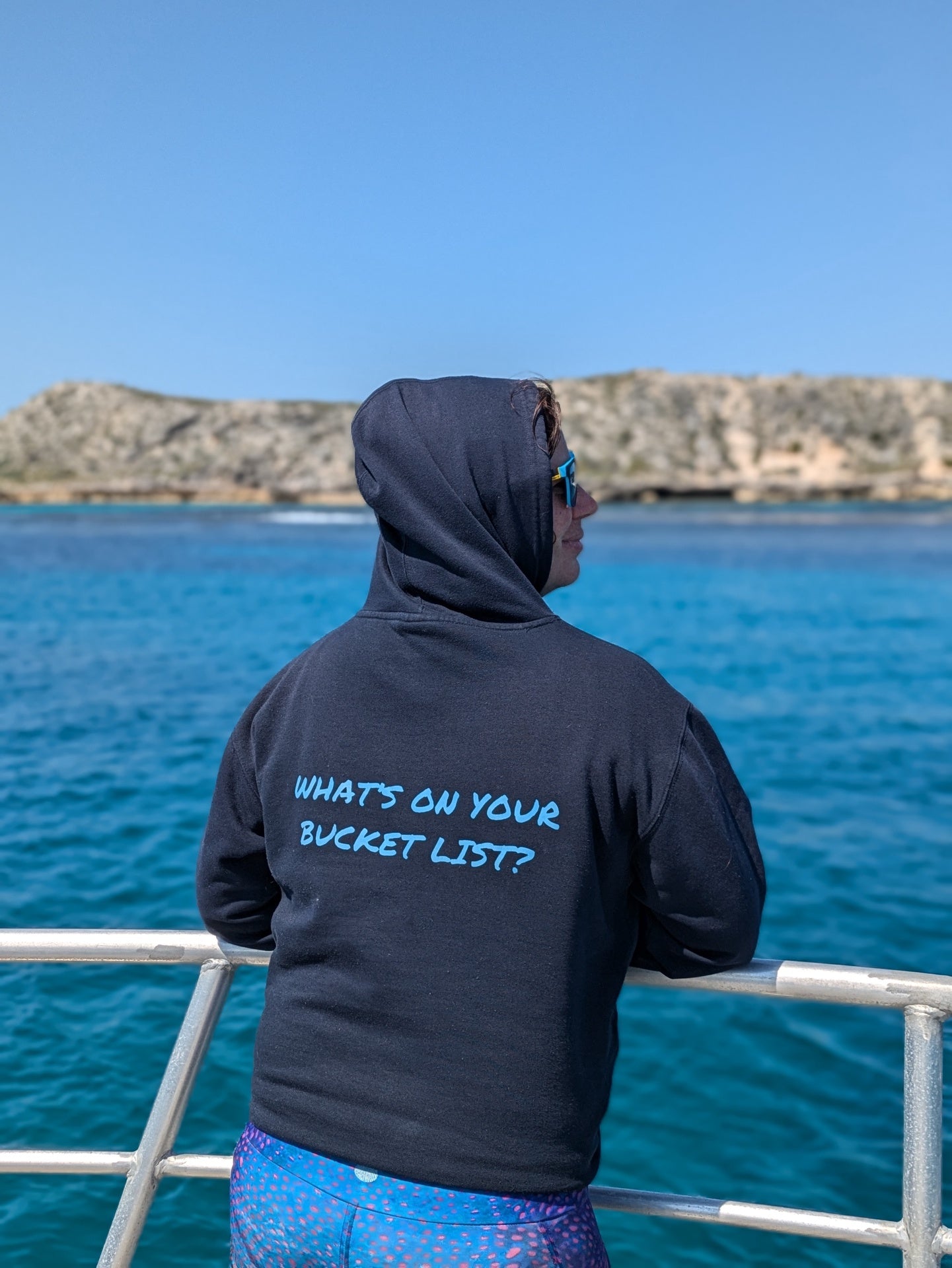 Bucket List Diver hoodie featuring a comfortable black fabric and front chest logo, perfect for diving enthusiasts.
