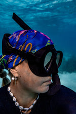 Diver Mon Art UV neck gaiter hood with turtle design, providing sun and hair protection, made of lightweight fabric.