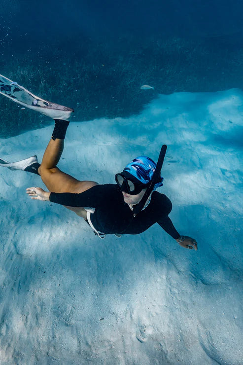 Diver Mon Art UV neck gaiter hood with turtle design, offering sun and hair protection, shown worn over head and neck.