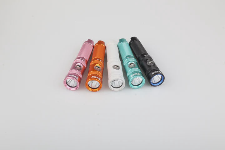 Pink Kraken NR-1000 dive light torch with waterproof body and adjustable beam for underwater exploration.