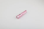 Pink Kraken NR-1000 dive light torch with sturdy handle and waterproof design, suitable for underwater exploration.