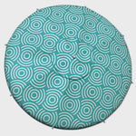 Mirage Beach Umbrella with matching seats and blanket in coral color, providing shade and comfort at the beach.