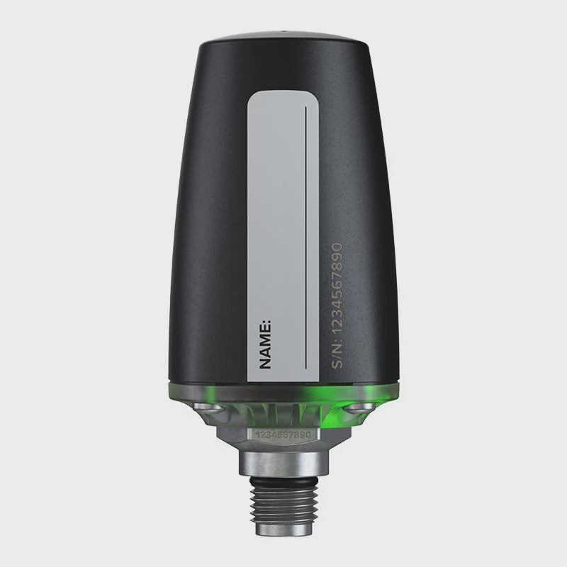 Suunto Tank Pod accessory and tank module, compact device with digital display, used for dive data monitoring and logging.