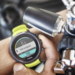 Suunto Tank Pod accessory and tank module, compact device with digital display for diving or outdoor activities.